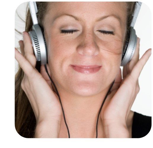 Downloable Audiobooks-Woman Listening to Audio Book